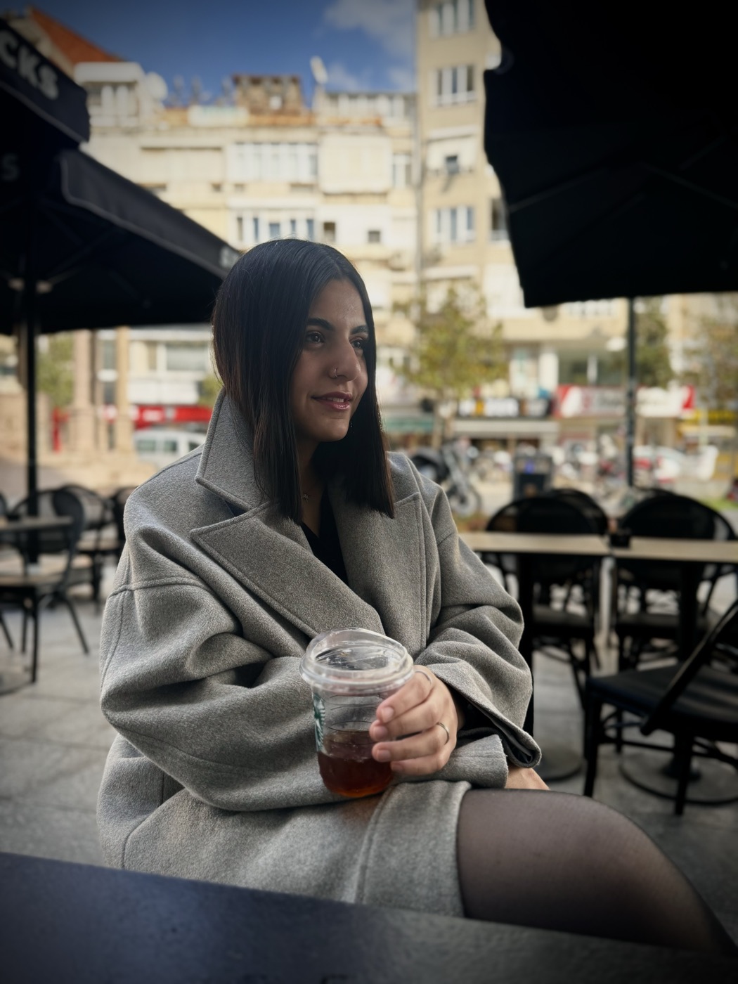Jasmine Bahrami at a cafe